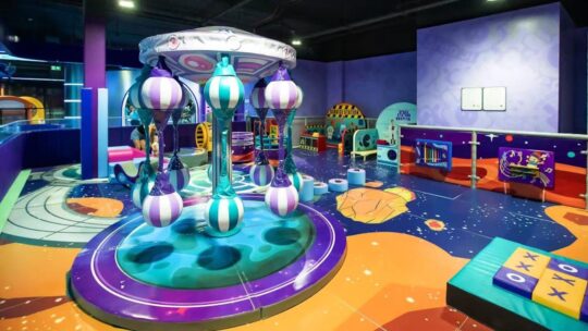 The toddler room at Area51 play centre, with colourful play equipment